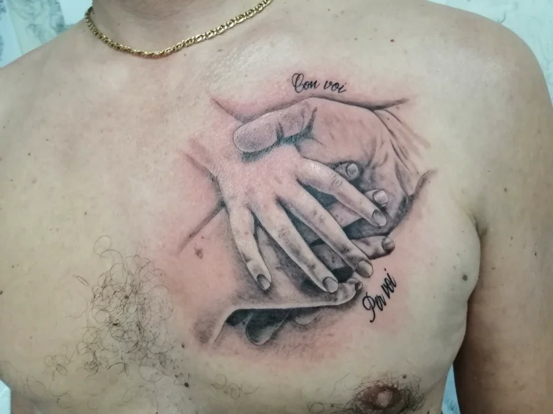 realistico-padre-figlio-petto