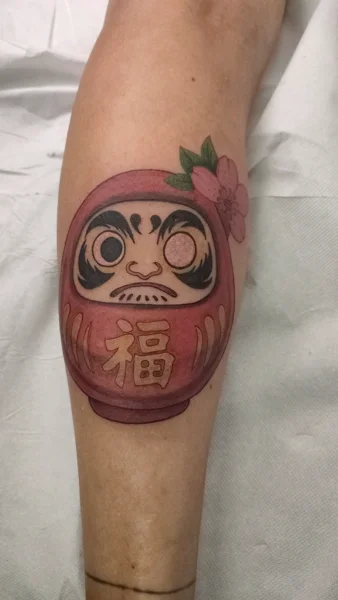 simboli-daruma-braccio